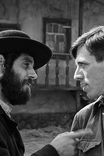 two men talking - b&w photo